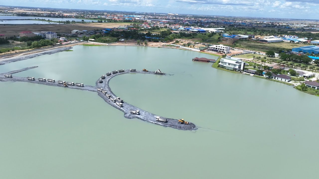 Good Working With Wheel Loader Pushing Filling The Lake Team Work Dump Truck Loading Rock
