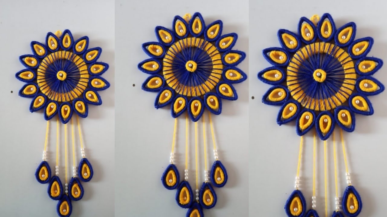 DIY easy woolen and newspapers wall hanging!! Best out of waste woolen toran!! wall decor!!