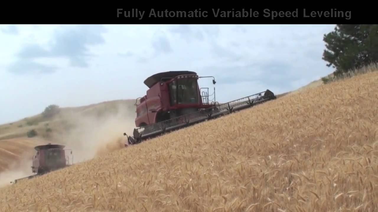Case-IH combine equipped with Hillco Hillside Leveling Systems