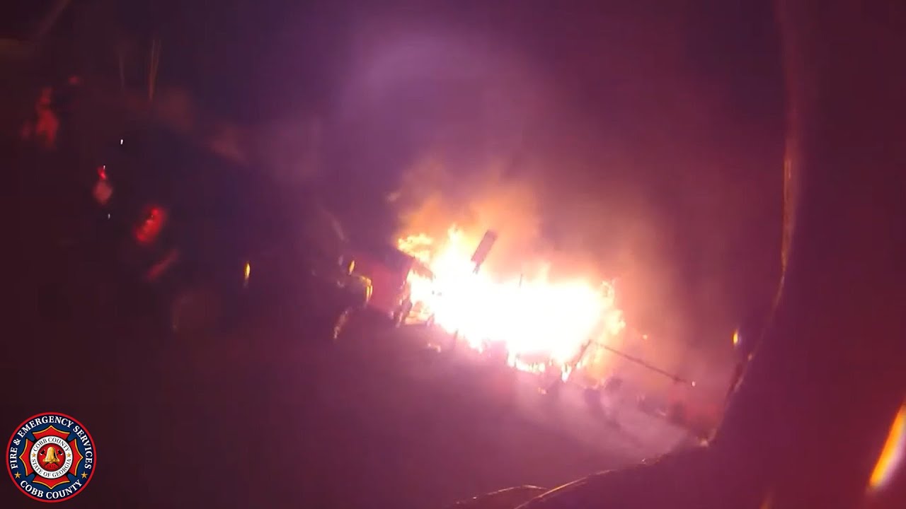 Engine & Squad 7 search and remove 3 victims from structure under heavy fire conditions.