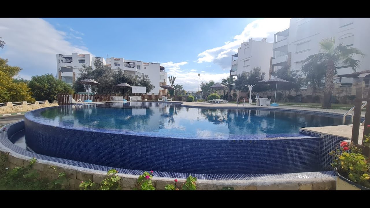 appart à rez de chaussée avec une grand jardins à vendre a résidence pied dans l'eau PLAYA DEL PACHA