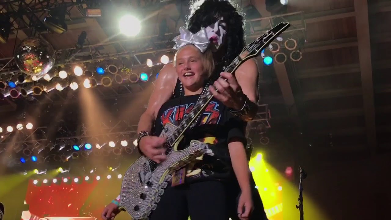 Paul Stanley and KISS on stage with my daughter Angelina Kmiec at the RiverEdge Park in Aurora, IL.