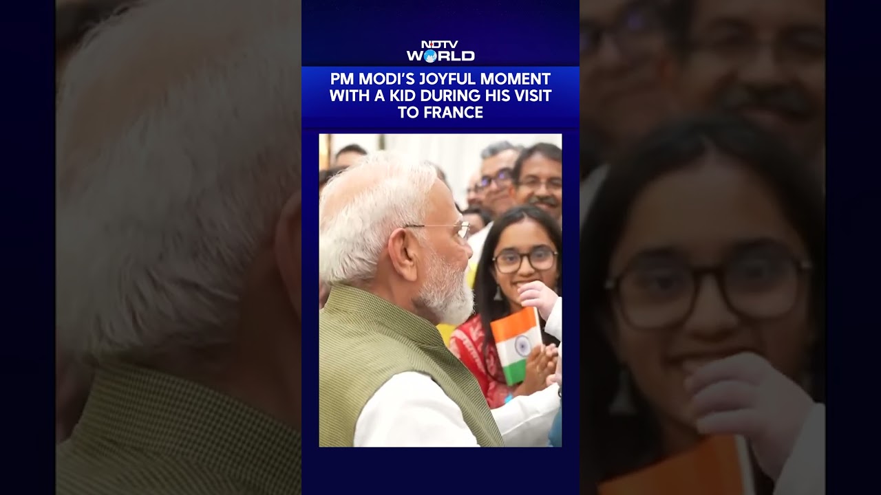 PM Modi's Joyful Moment With A Kid As The Indian Diaspora Welcomes Him In France