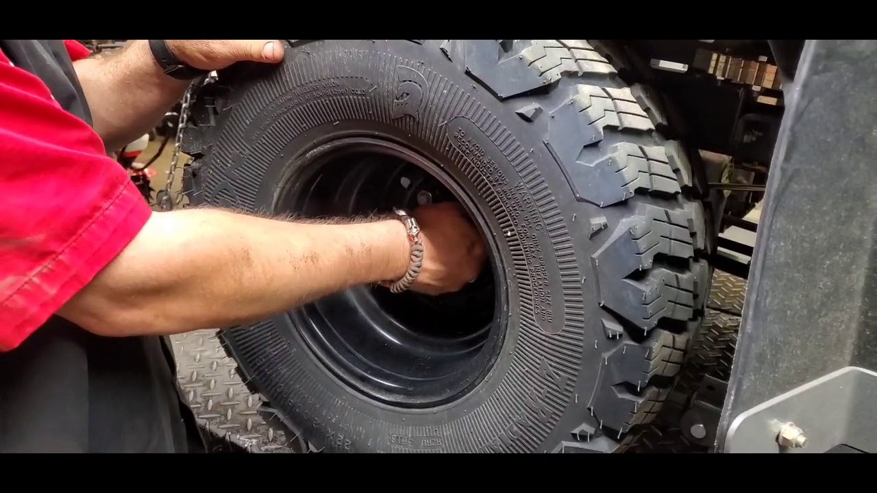 Adjusting the parking brake on a Spartan Zero Turn Mower.