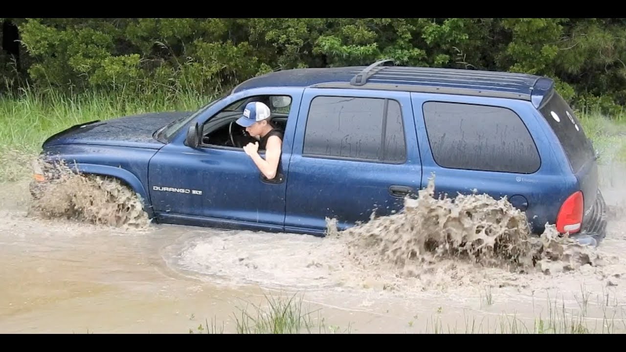 Dodge Durango Turning Hard in Deep Mud