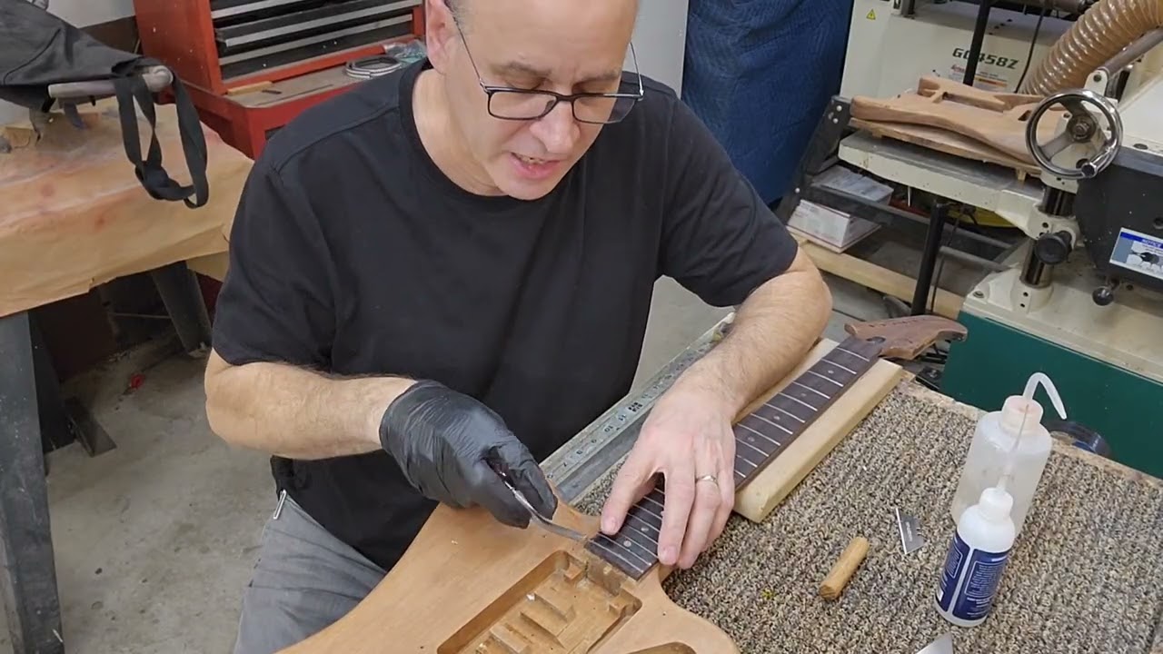 Refretting a Classic Part 3: level, crown, dress, polish
