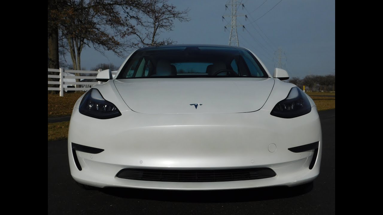 Tesla Model 3 Standard Range Plus 2021 года выпуска — пробег всего 49 000 миль, жемчужно-белый цв...