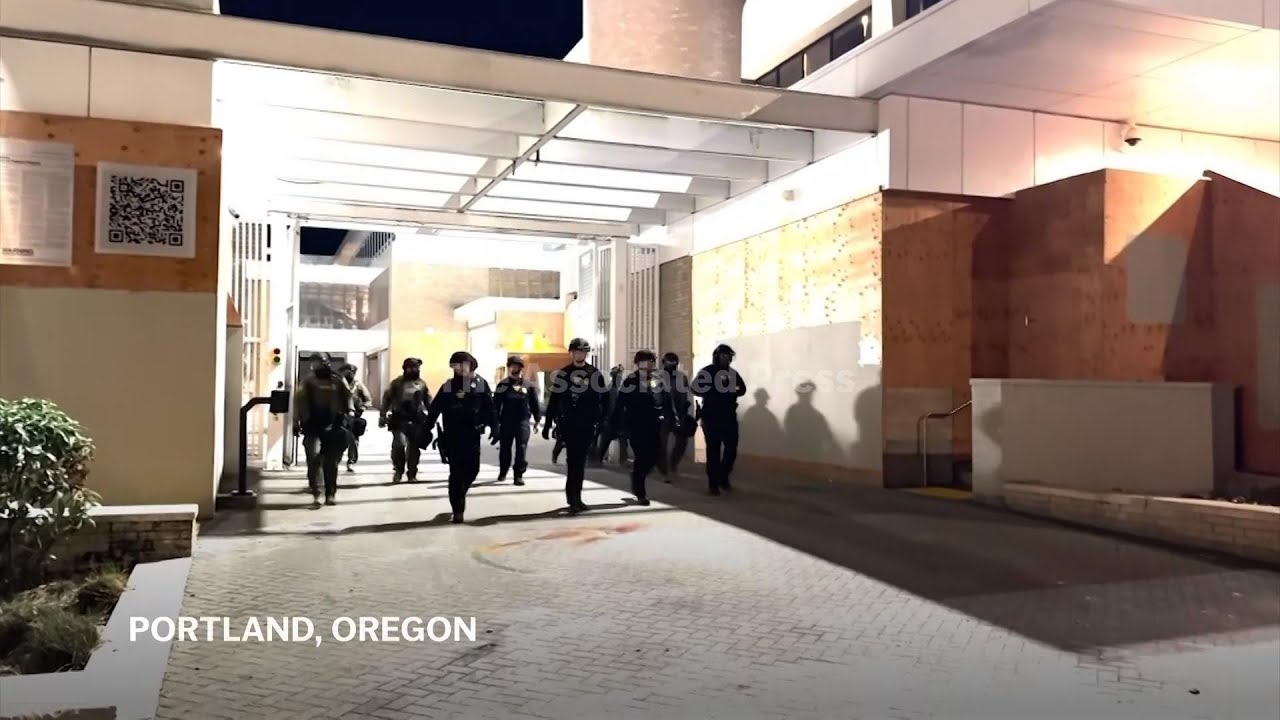 Protesters and officers face off outside Portland, Oregon ICE facility