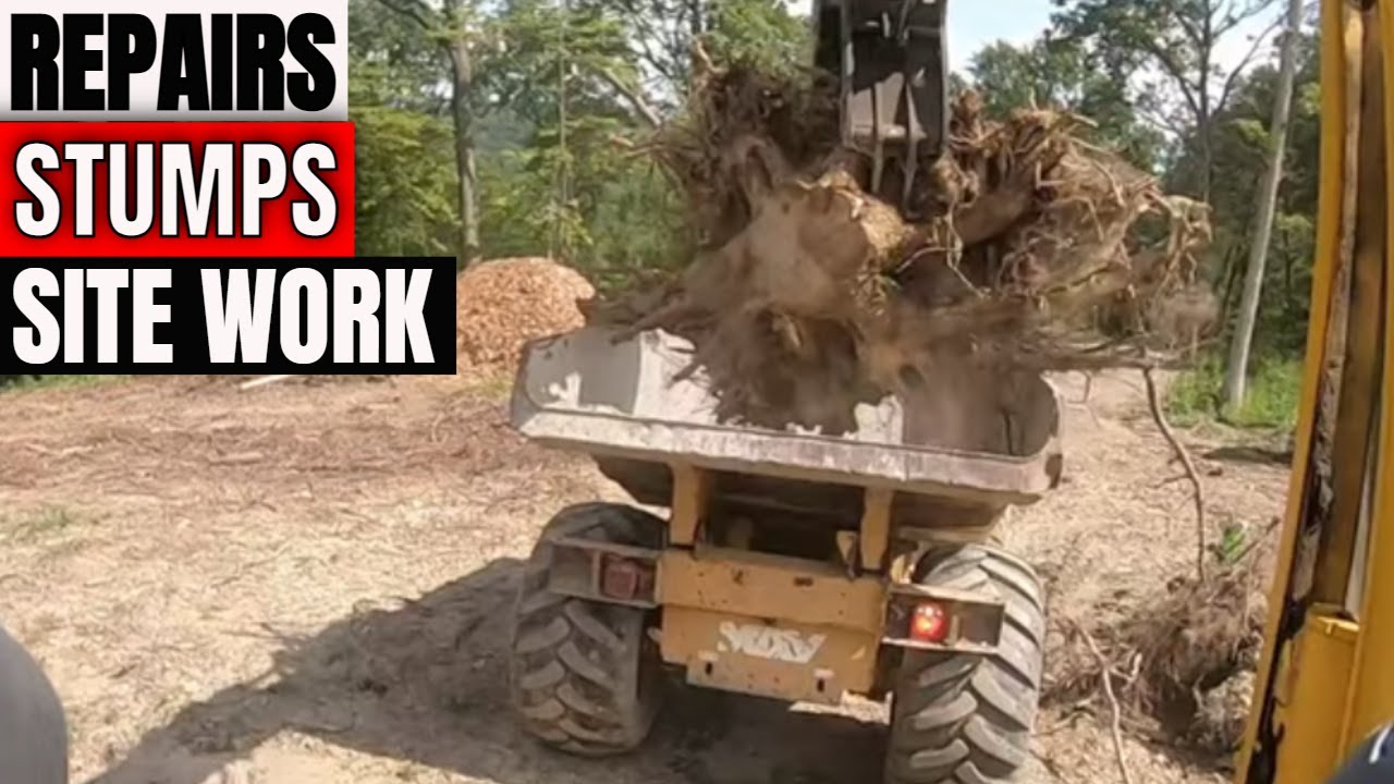 Loading stumps in a Hydrema 912 off road dump truck with a Komatsu PC88-8 excavator dirt boss