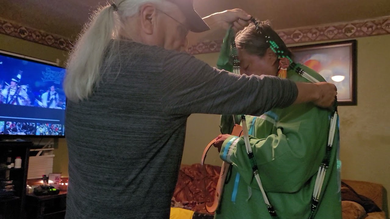 Learning how to put on Southern Straight regalia for the first time at 55 years old.