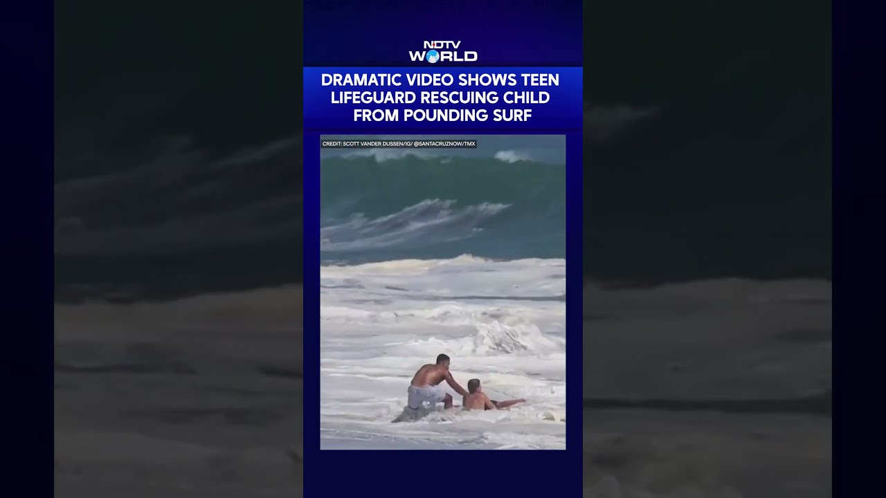 Dramatic Footage Shows Teen Lifeguard Saving A Child From Pounding Surf