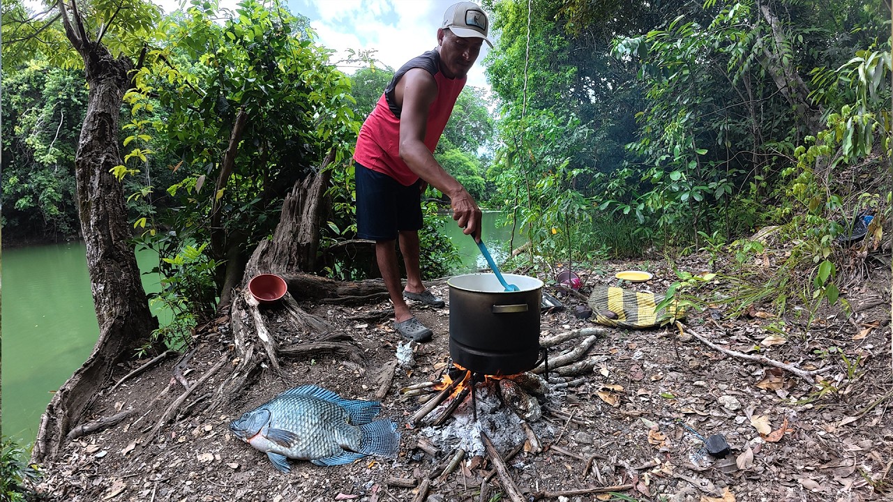 Pesca con arco, gigantes tilapias, cocinando junto al rio.