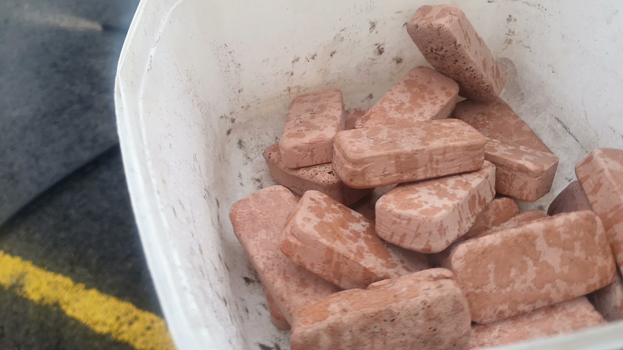 Sandblasting copper bars to clean off oxidisation