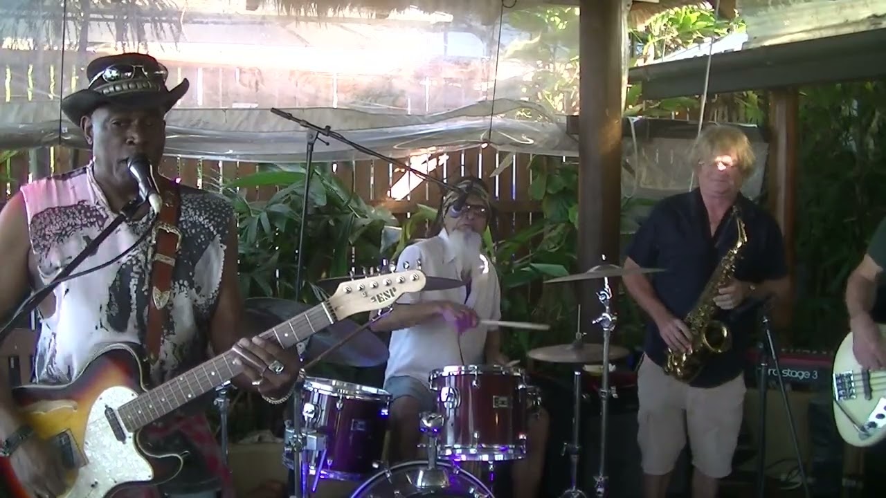 JJ Rome and the Jumpstarts 'Move it on over' at 'Strait on the beach, Cairns'.