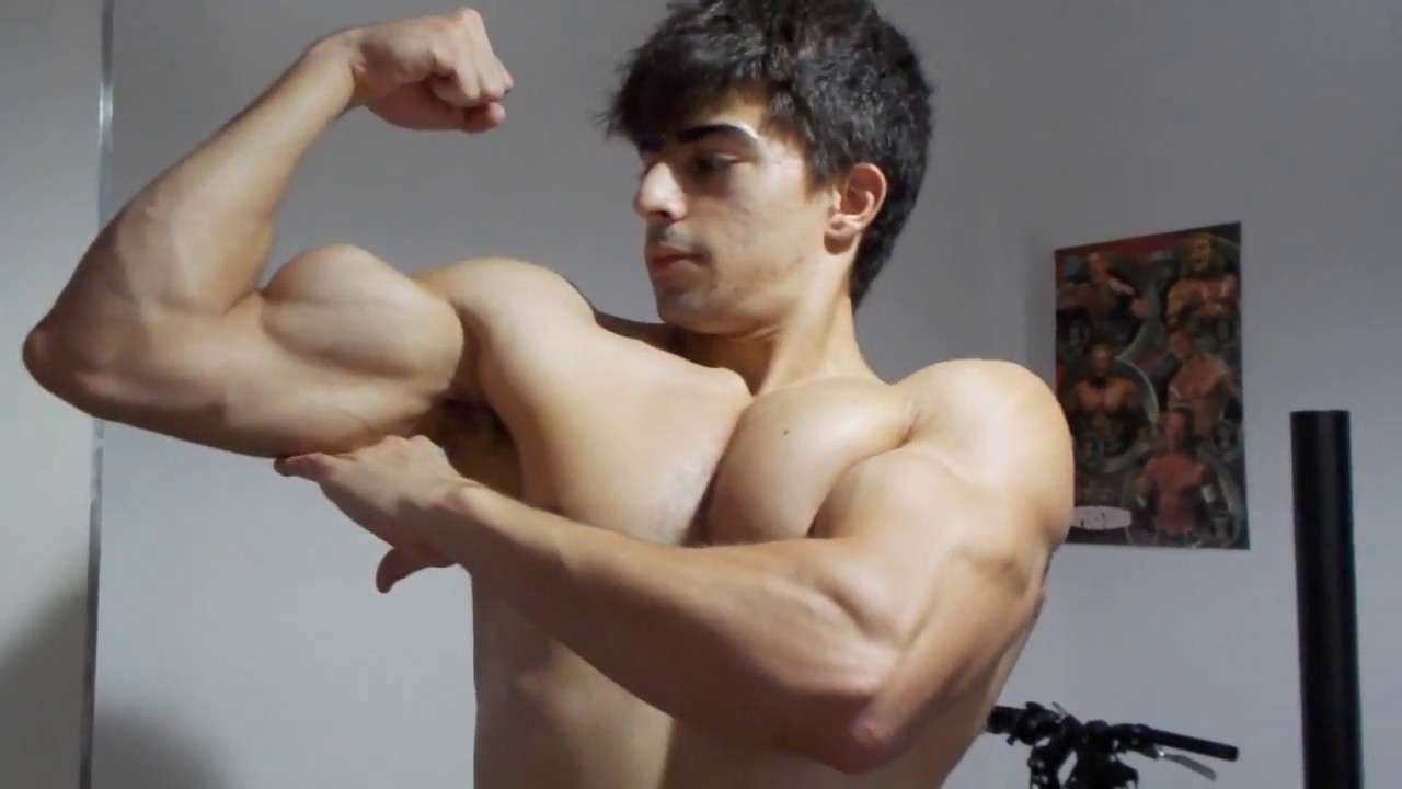 Flexing Double Biceps Veins in the car
