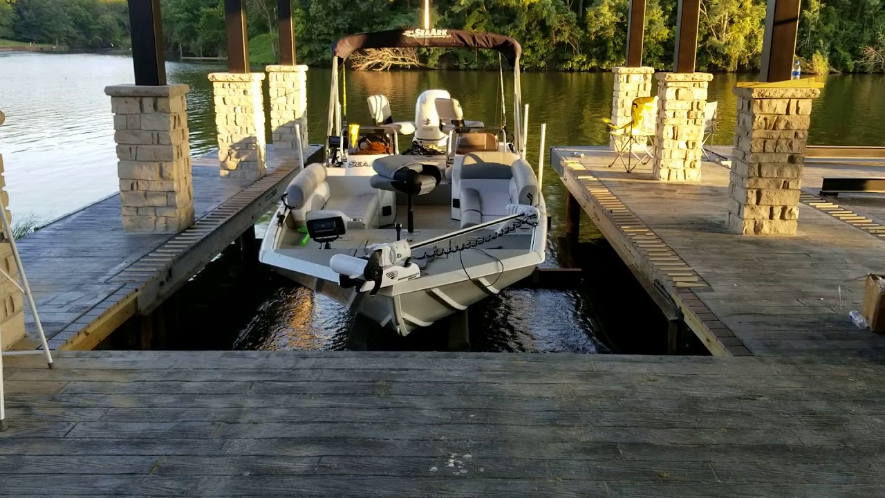 Custom boat lift Custom boathouse Custom boat dock.