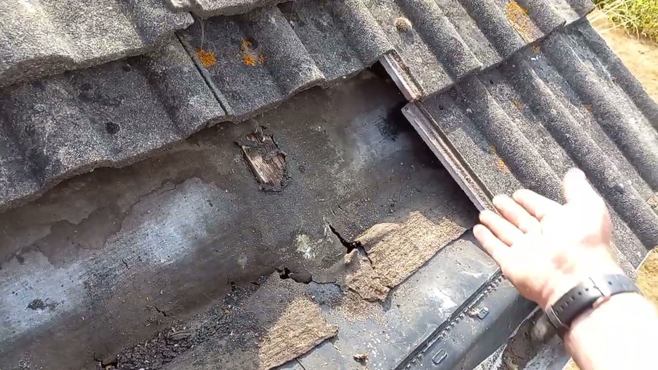 Roof repair, tile slipped due to rotten battens
