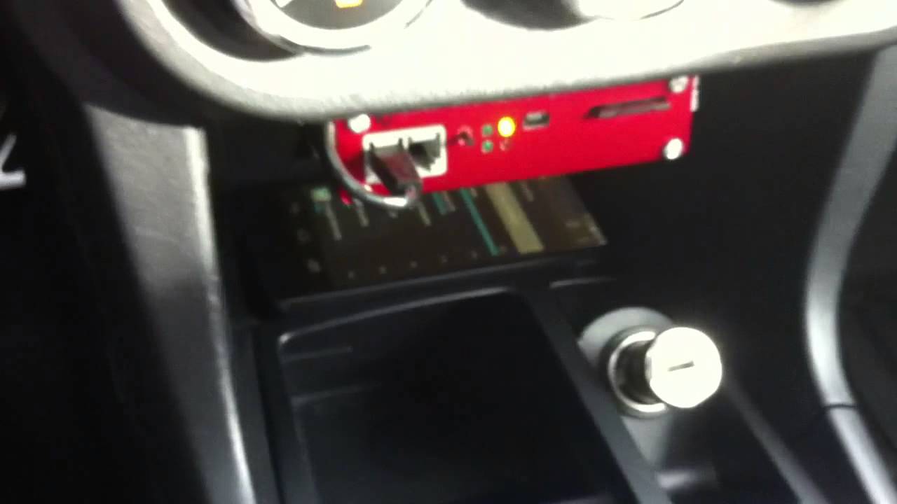 Qi wireless charger installed in car - Evo X