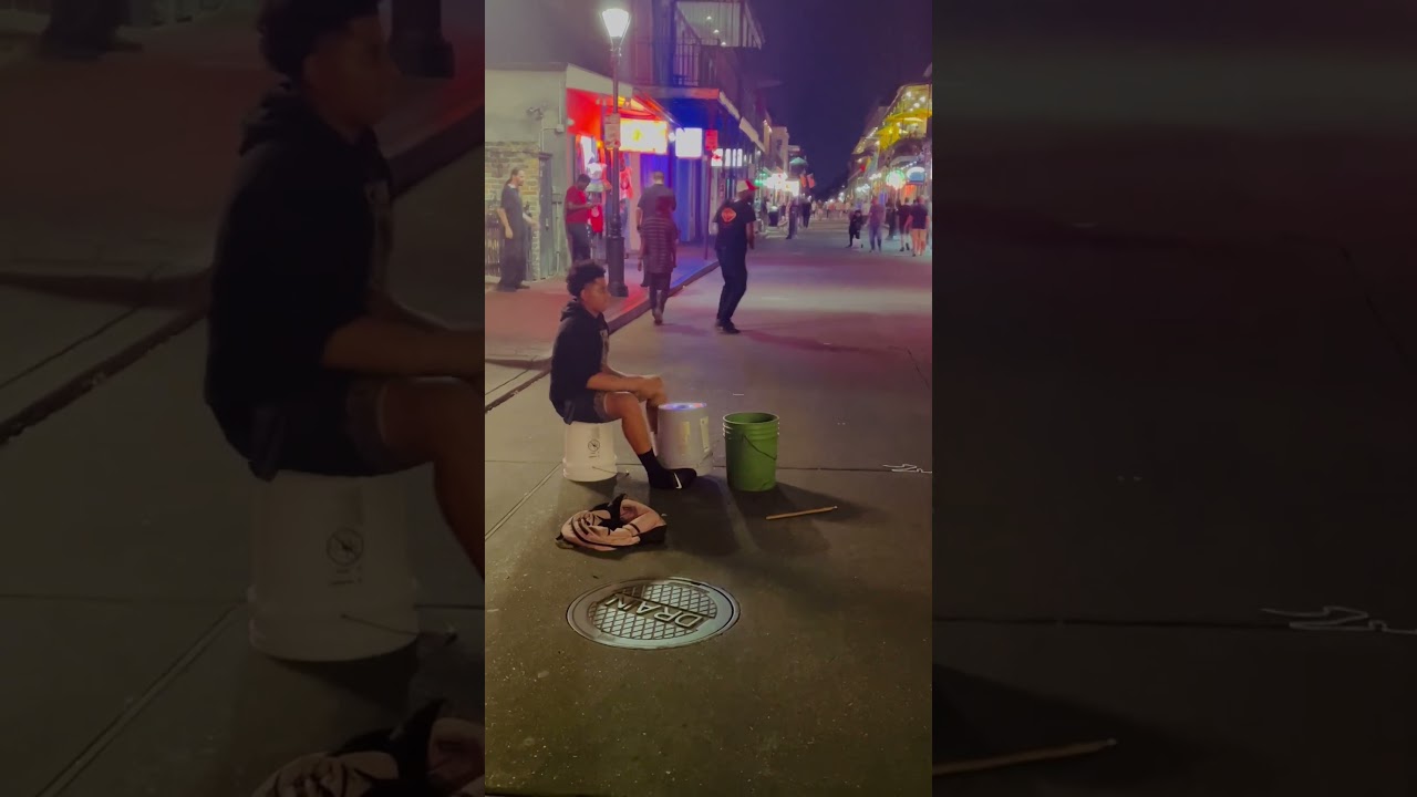 Cool kid drumming on Bourbon St / New Orleans drummer NOLA street performer