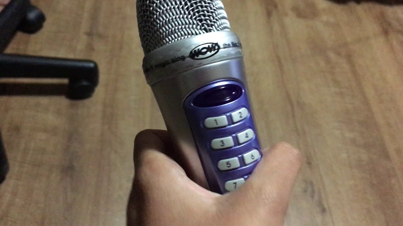 WOW Magic Sing ED-9000 microphones, VCD, WOW Fiesta WF210 songlist and Magic Sing EG-18000 usb disc.