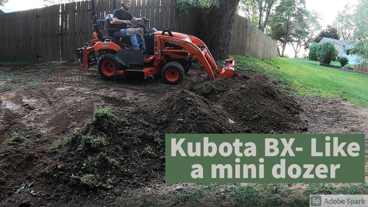 Kubota BX — выравнивание и создание уклонов склона с помощью FEL