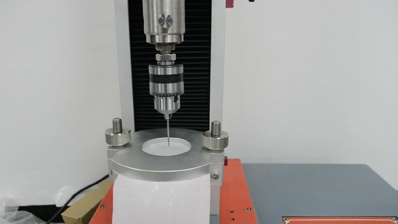 Tensile machine ( ASTM F 1306 puncture testing demo )