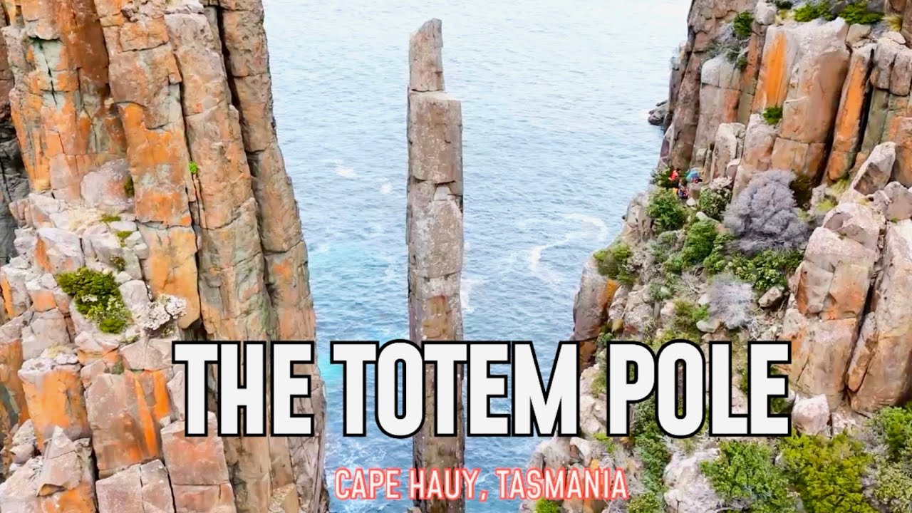 Climbing the iconic Totem Pole in Tasmania