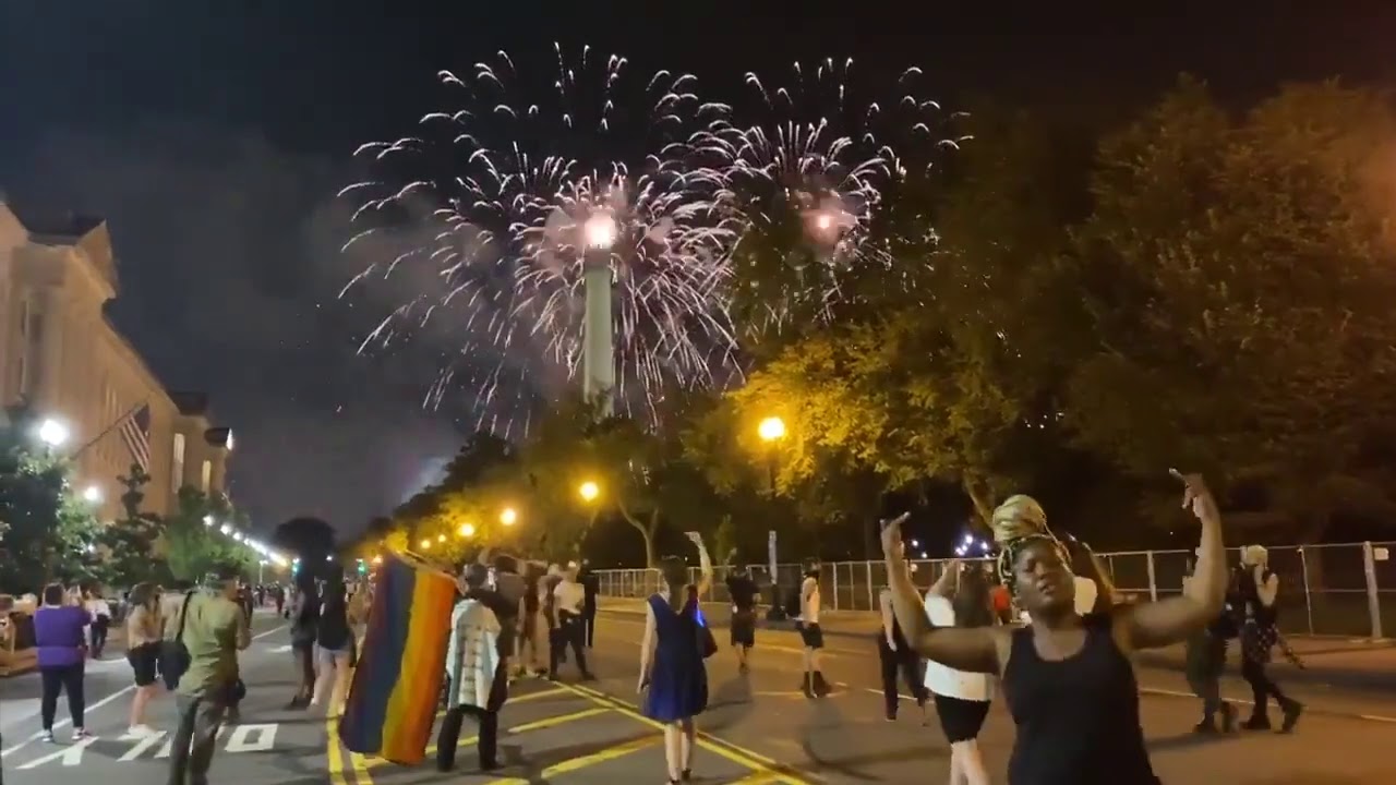 People scream &ldquo;fuck Trump&rdquo; as fireworks go off in the background in DC