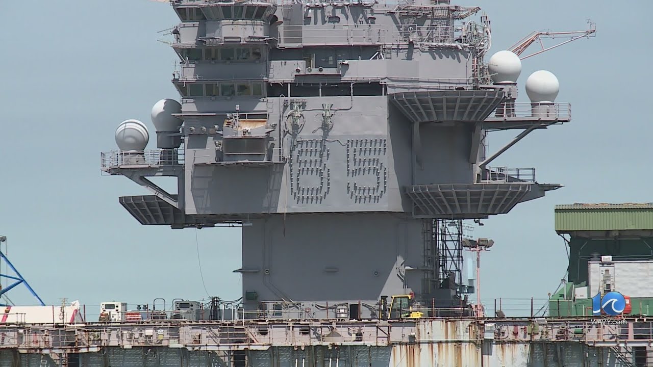 Former USS Enterprise prepares for tow to scrapper