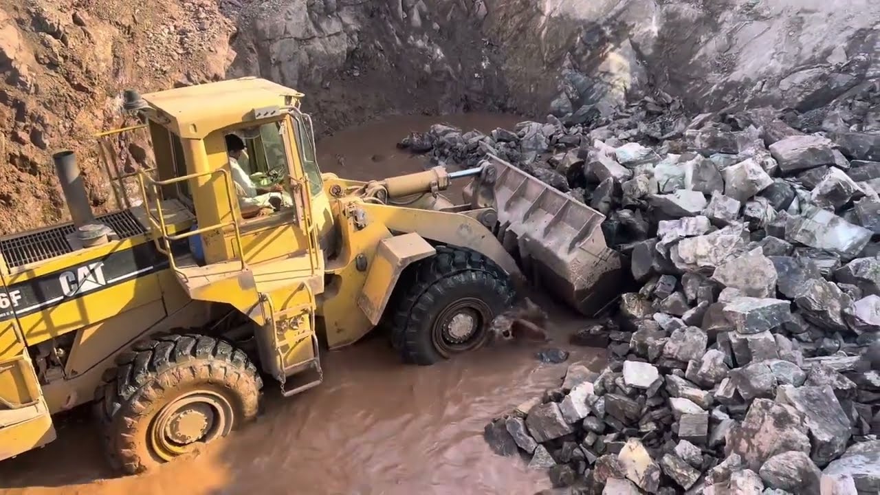 Dump Truck Loading with CAT 966D Big Rocks No Problem | CAT Loader