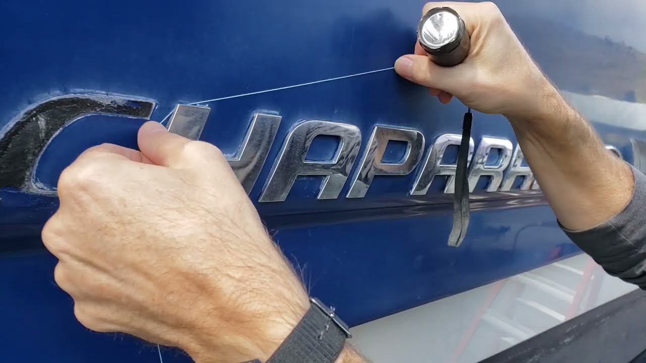 Boat detailer runs from water. Gelcoat polishing