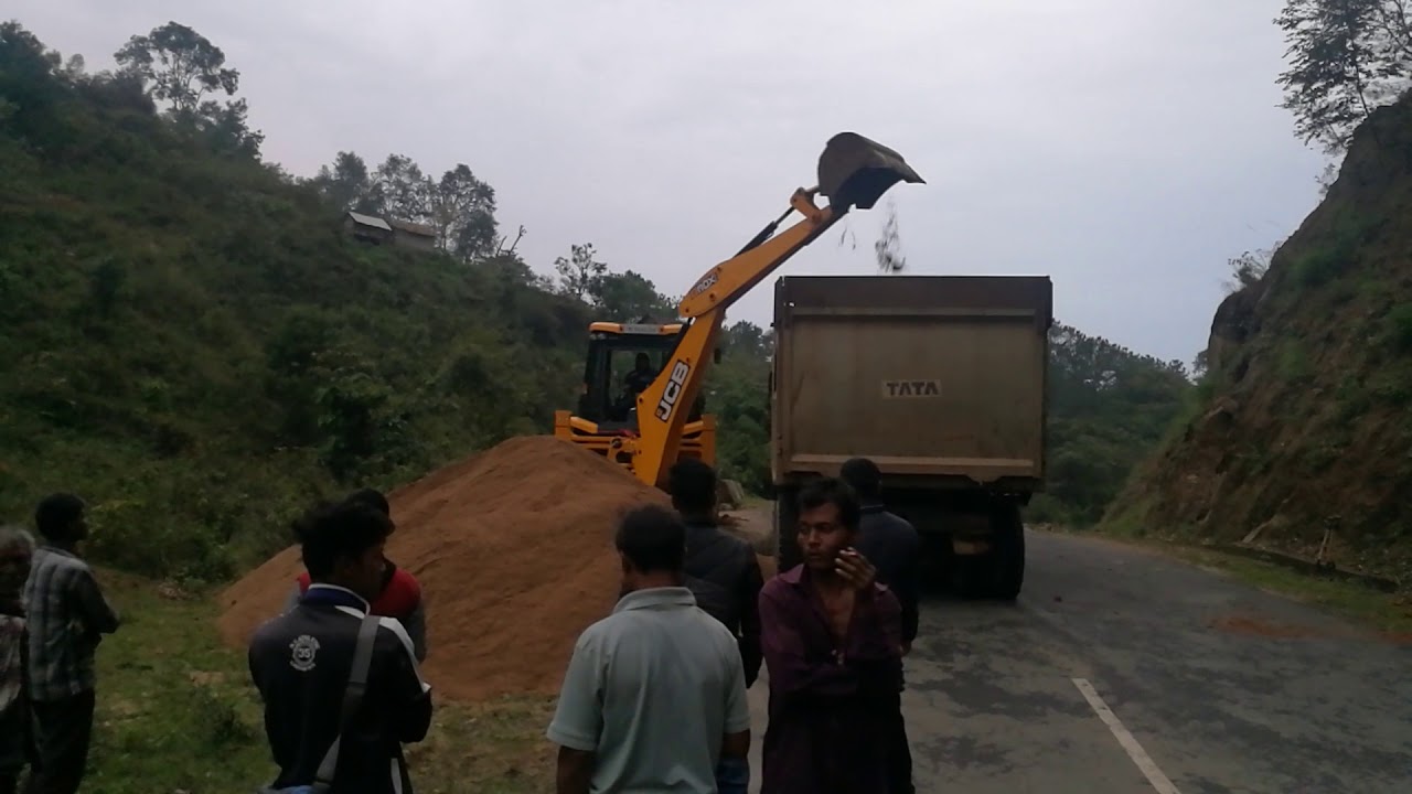 jcb 3dx  super loading sand into a tata 2518 dump truck