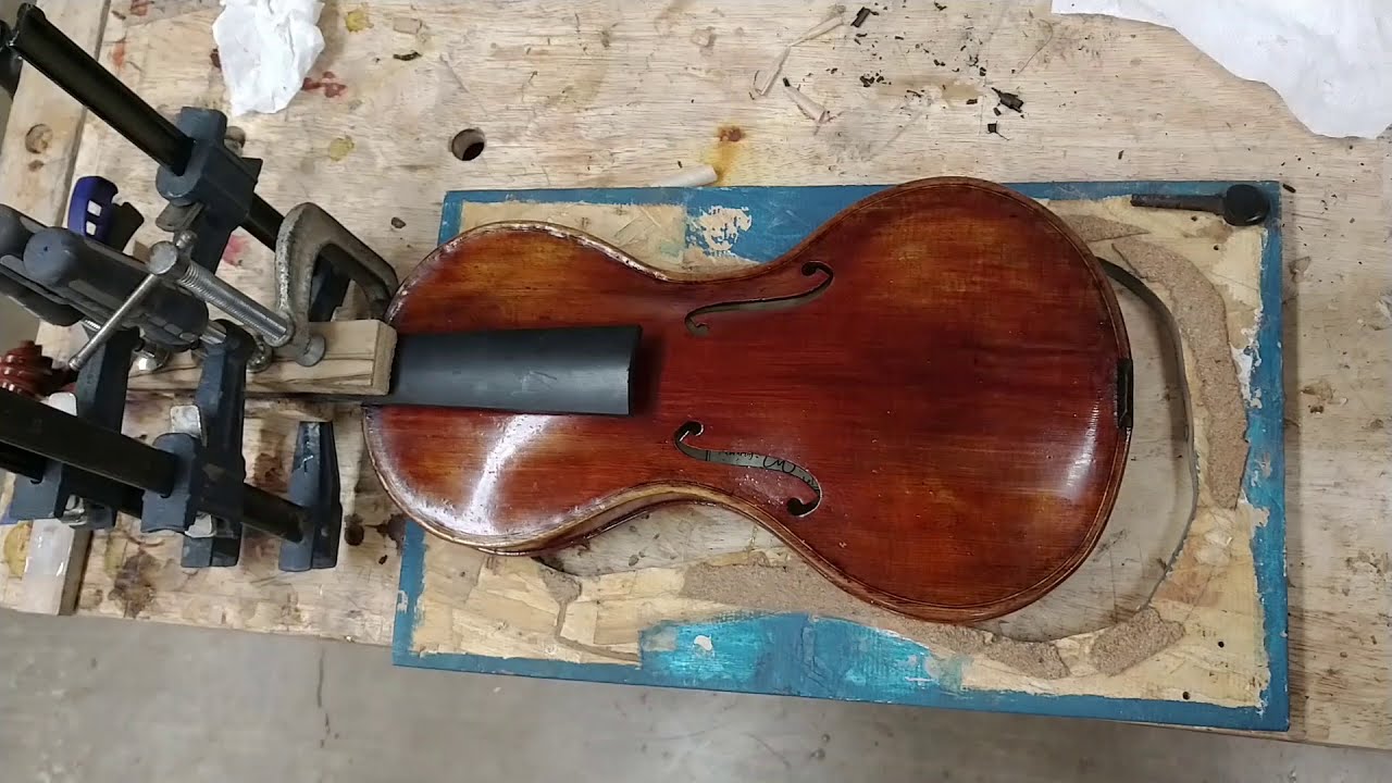 Gluing a fingerboard onto a violin