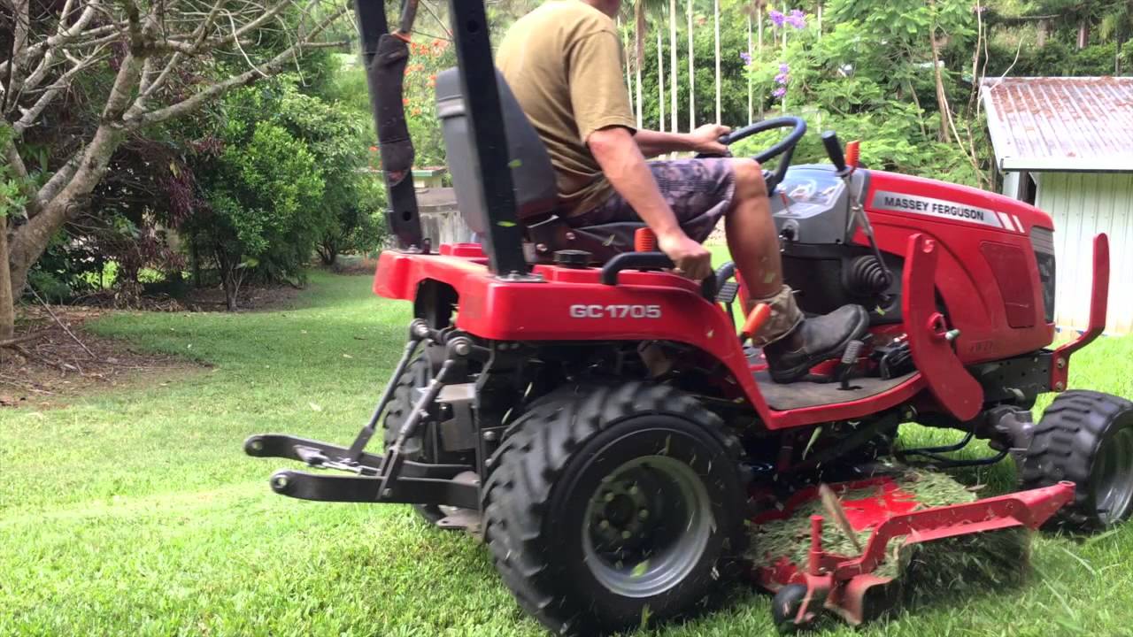 Mowing with a Massey Ferguson GC 1705 Pt2