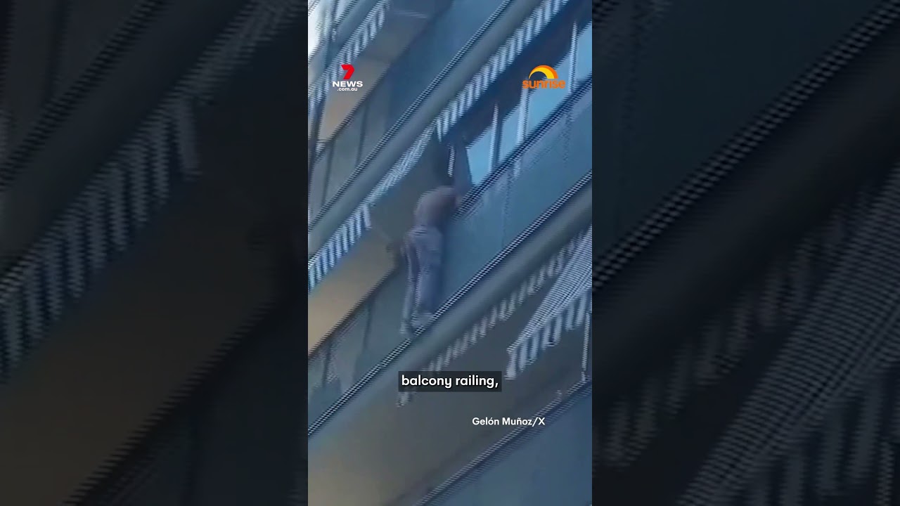 Man rescues child dangling from balcony