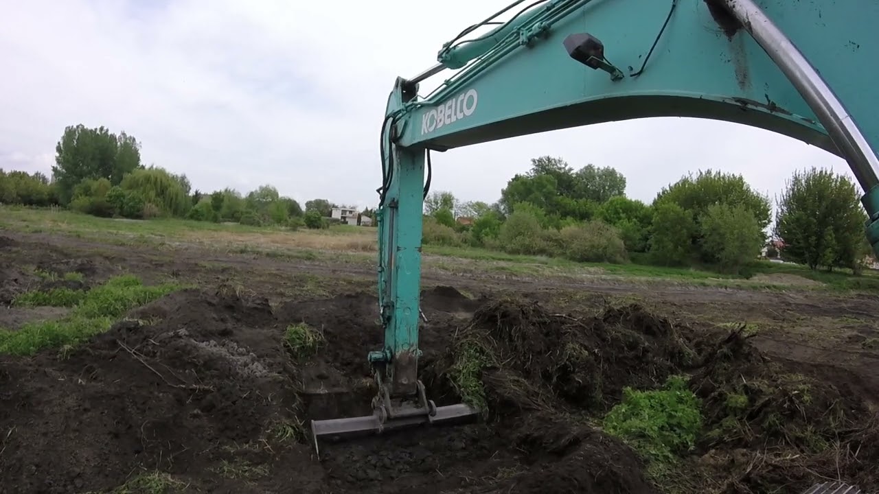 L&aacute;nctalpas forg&oacute;rakod&oacute;, mocs&aacute;rj&aacute;r&oacute;, markol&oacute;, m&eacute;ly&aacute;s&oacute;, Kobelco, magyar.