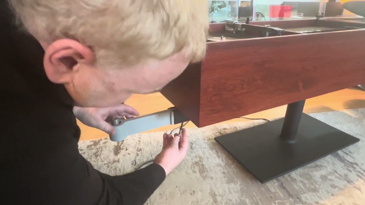 Installing the Speaker Support Arms