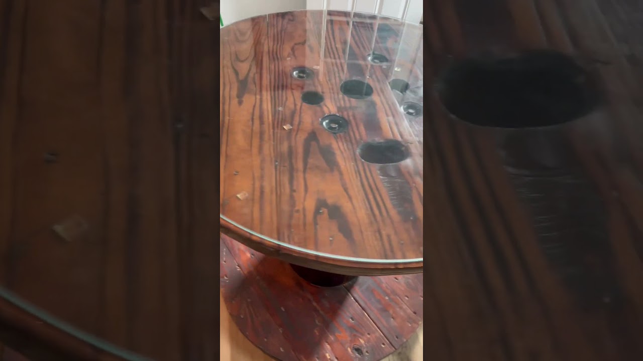 Wooden spool table with glass top. Selling #homestead