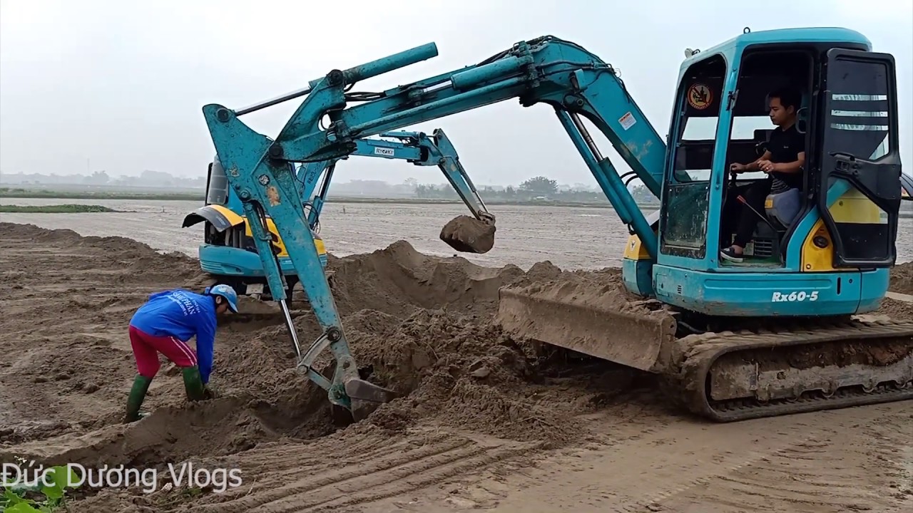 Twice Excavator Mini at work - kubota mini excavator working