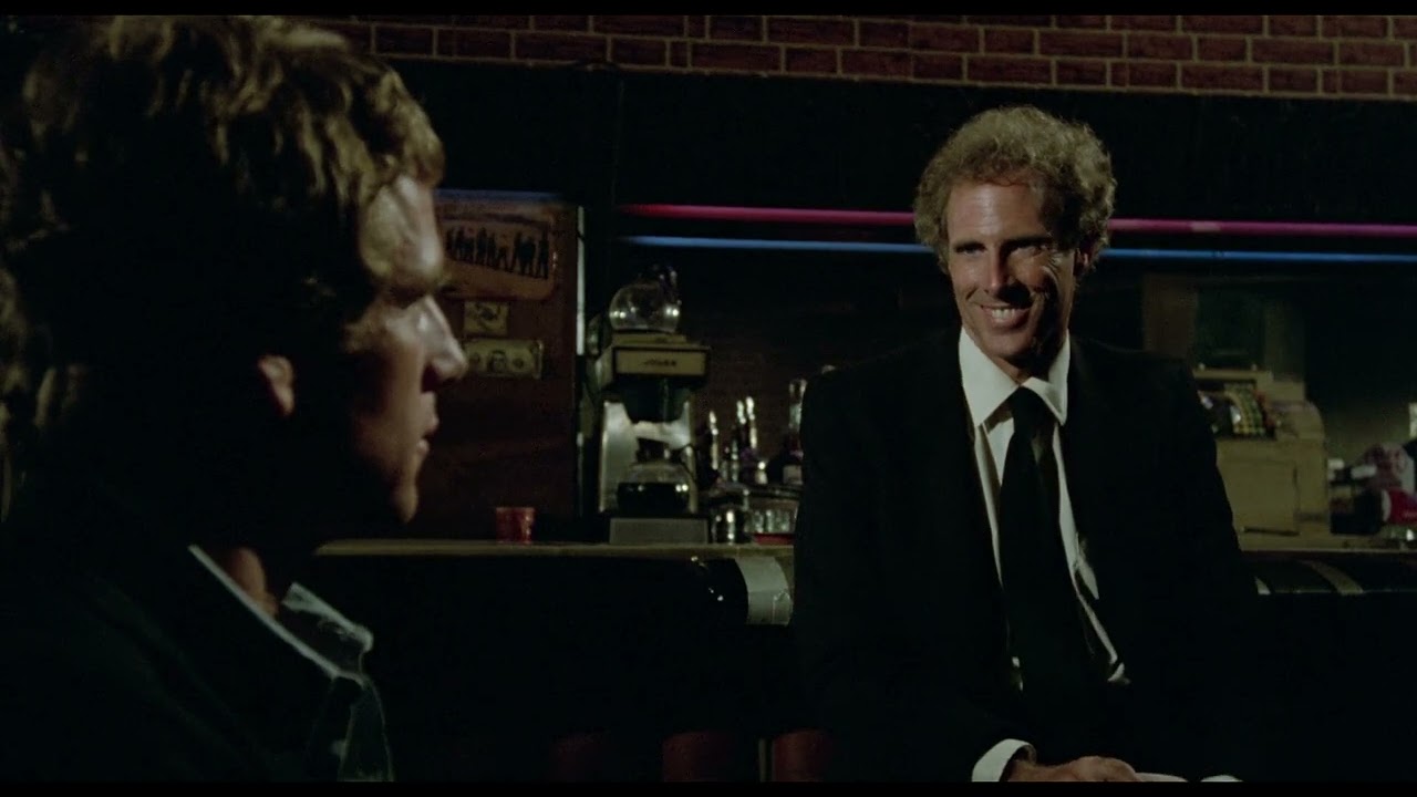 Detective Bruce Dern Harasses Getaway Driver Ryan O'Neal in Walter Hill's Classic 