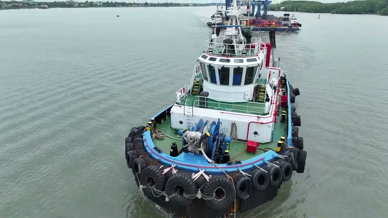 Tan cang 62 towed barge with 2 Mitsui STS crane from TC Phu Huu to Long Son International Port
