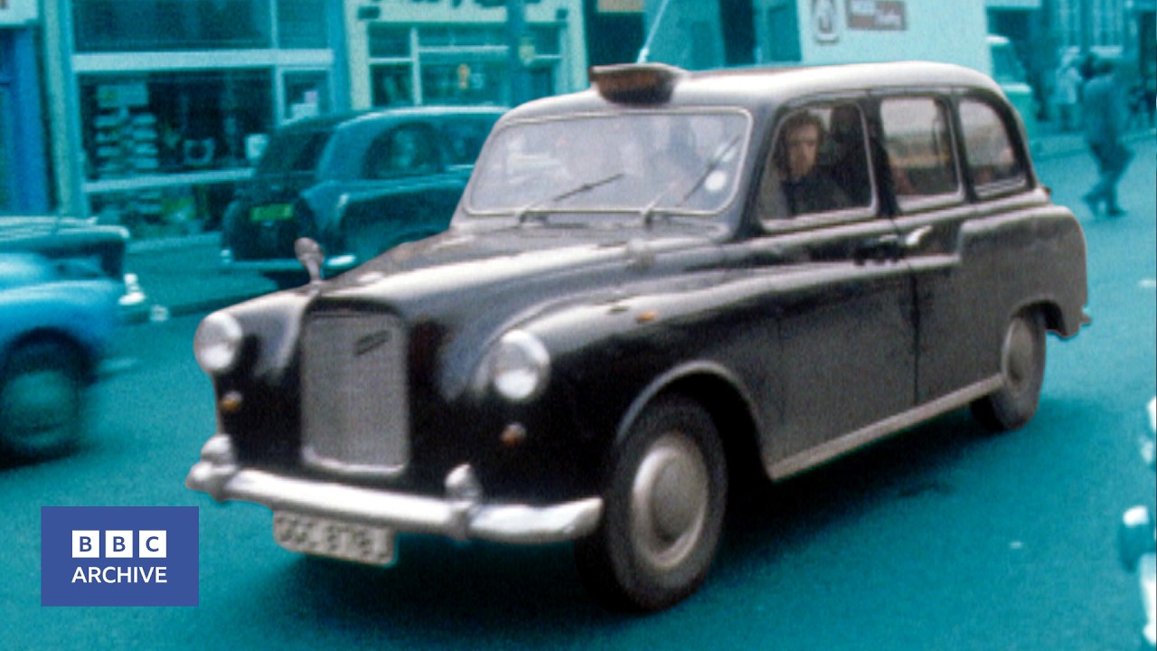 1974: Take a Trip in a West Belfast BLACK TAXI | Nationwide | Retro Transport | BBC Archive