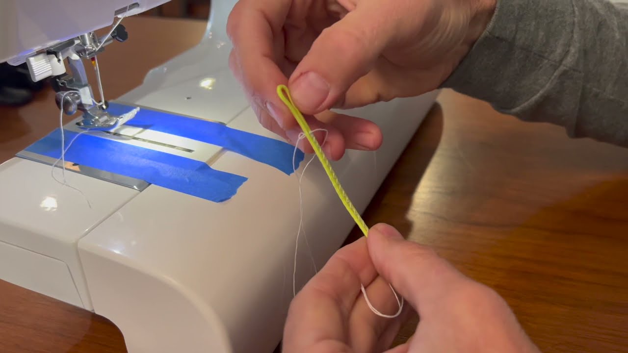 A 3D printed line jig for sewing a loop in a paragliding line.