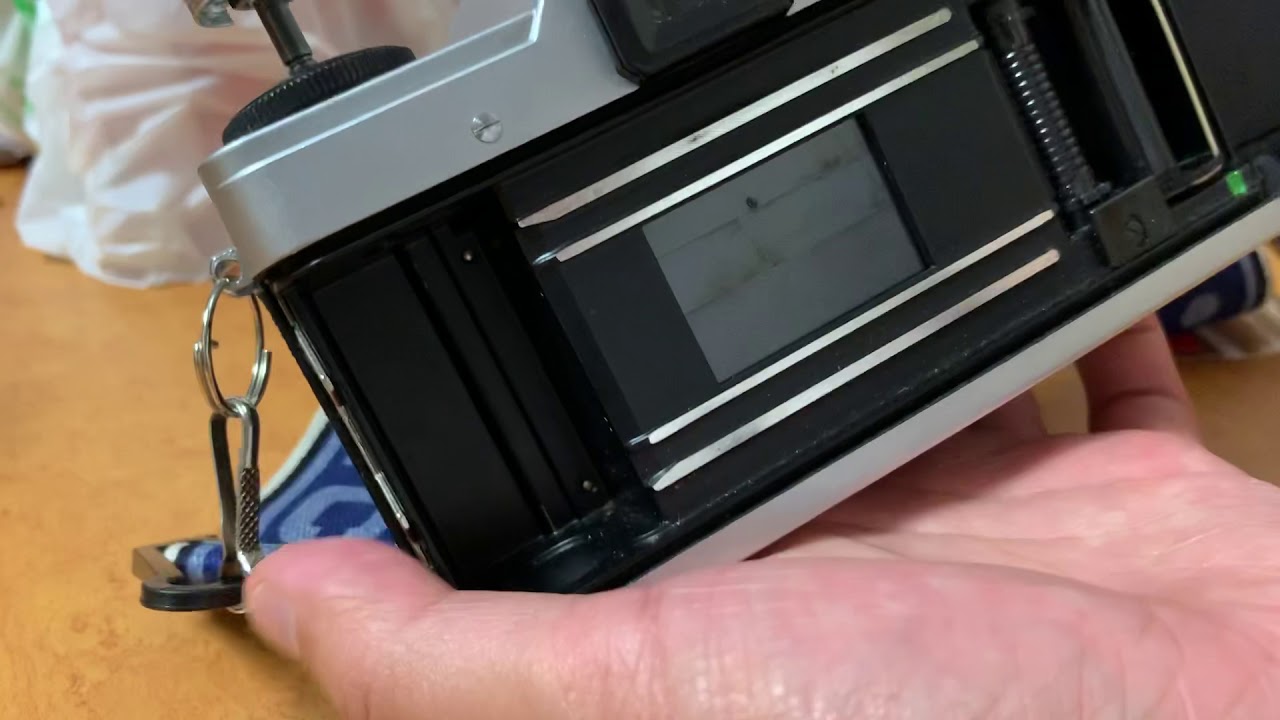 PRAKTICA LLC Film Change