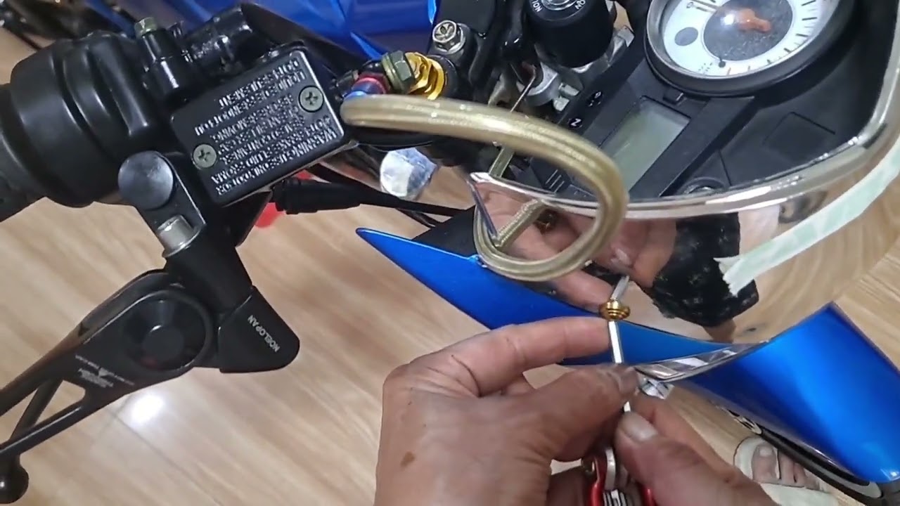 Installing Suzuki raider visor emblem