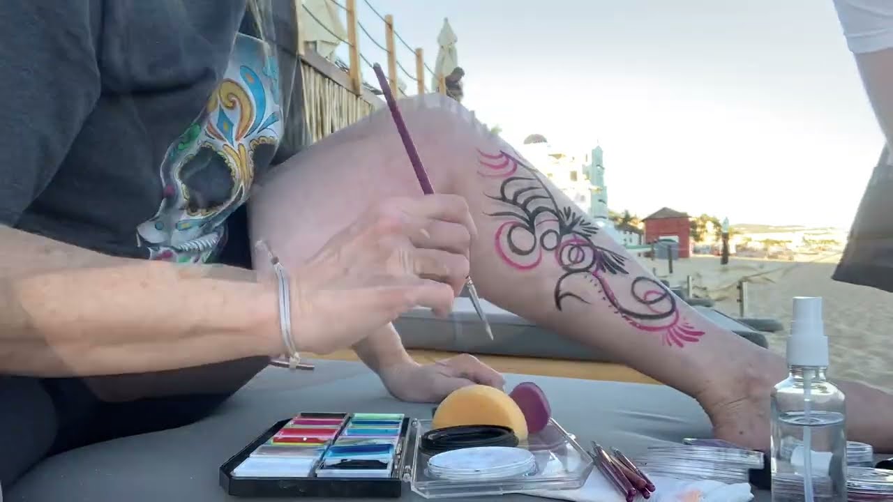 Time lapse body painting on the beach.