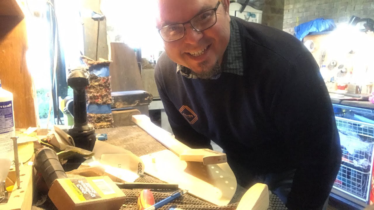 Fixing a broken screw in a headstock