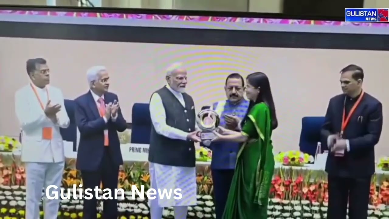 DC Kupwara Ayushi Sudan recieving award from the Prime Minister of India, Narendra modi