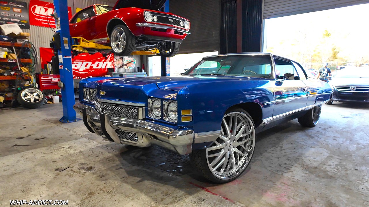 Donks and a Cadillac at Baby Bird Auto! Big Boogie's 73' Donk, Kandy Escalade on 32s