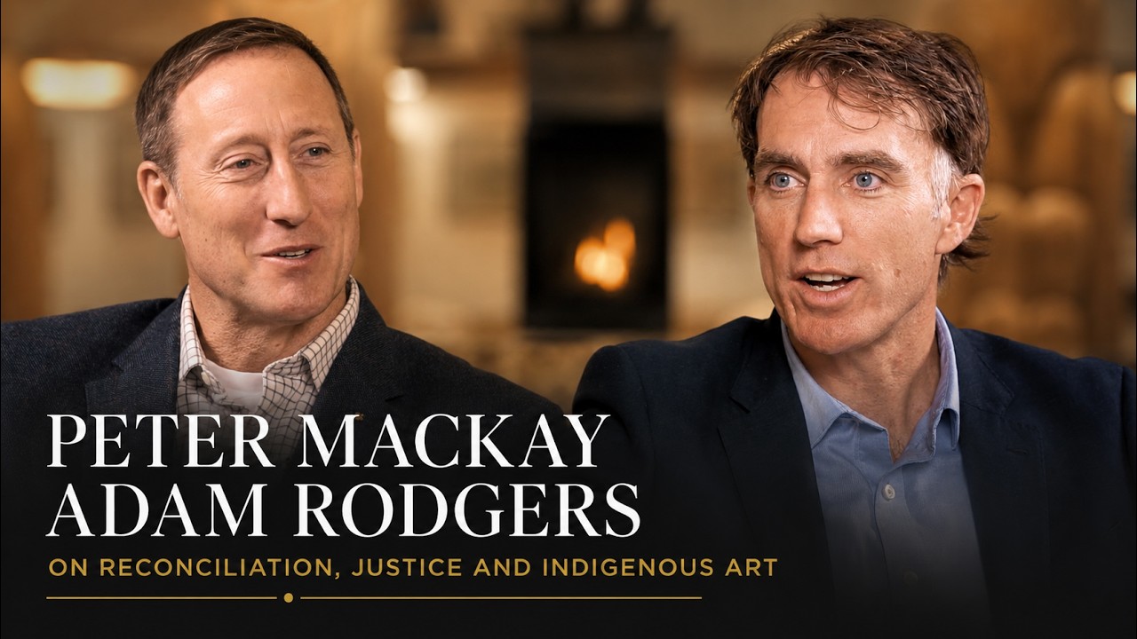 The Honorable Peter MacKay and Rotary Club president Adam Rodgers engage in reconciliation talks